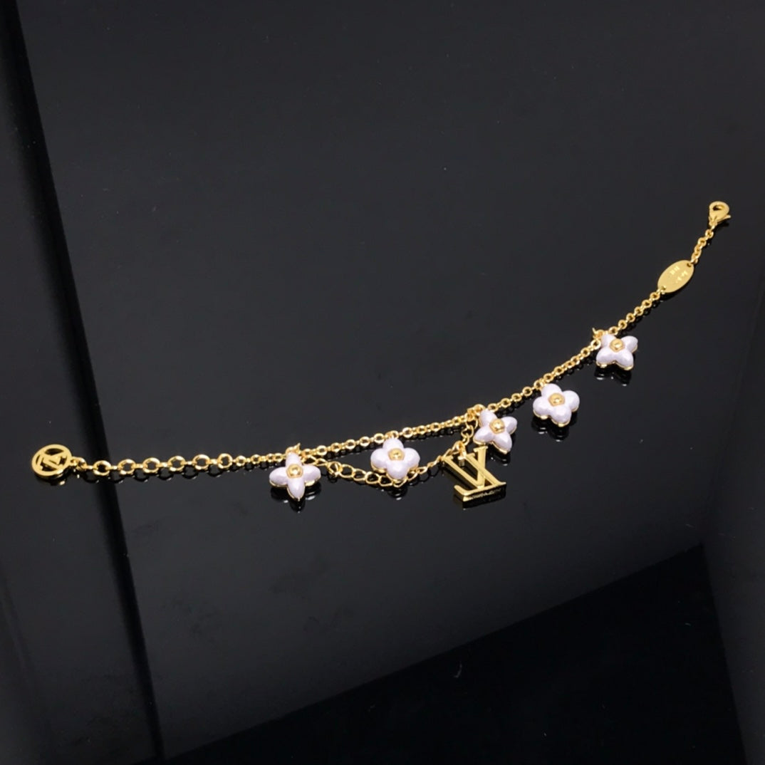 Mysitc LOGO 6 MOTIF STAR AND SUN GOLD BRACELET
