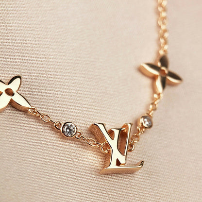 Mysitc STAR AND SUN 7 MOTIFS GOLD BRACELET