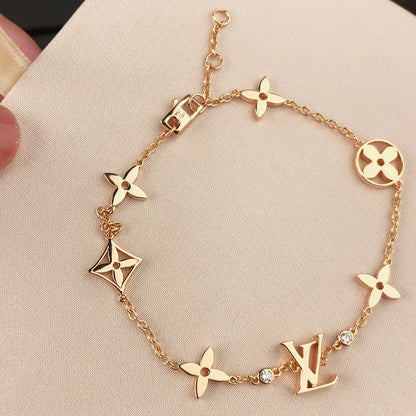 Mysitc STAR AND SUN 7 MOTIFS GOLD BRACELET