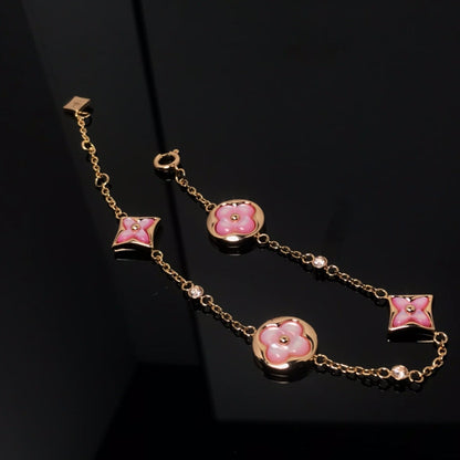 Mysitc STAR AND SUN 4 MOTIF PINK MOP PINK GOLD BRACELET