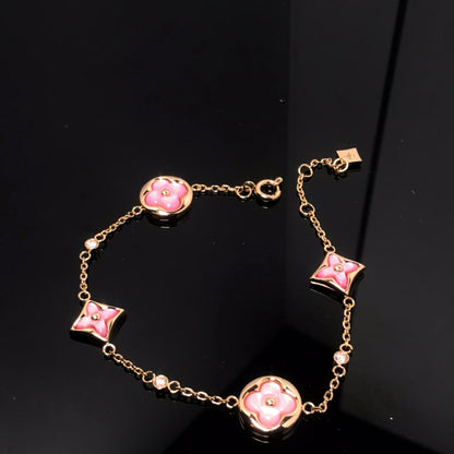 Mysitc STAR AND SUN 4 MOTIF PINK MOP PINK GOLD BRACELET