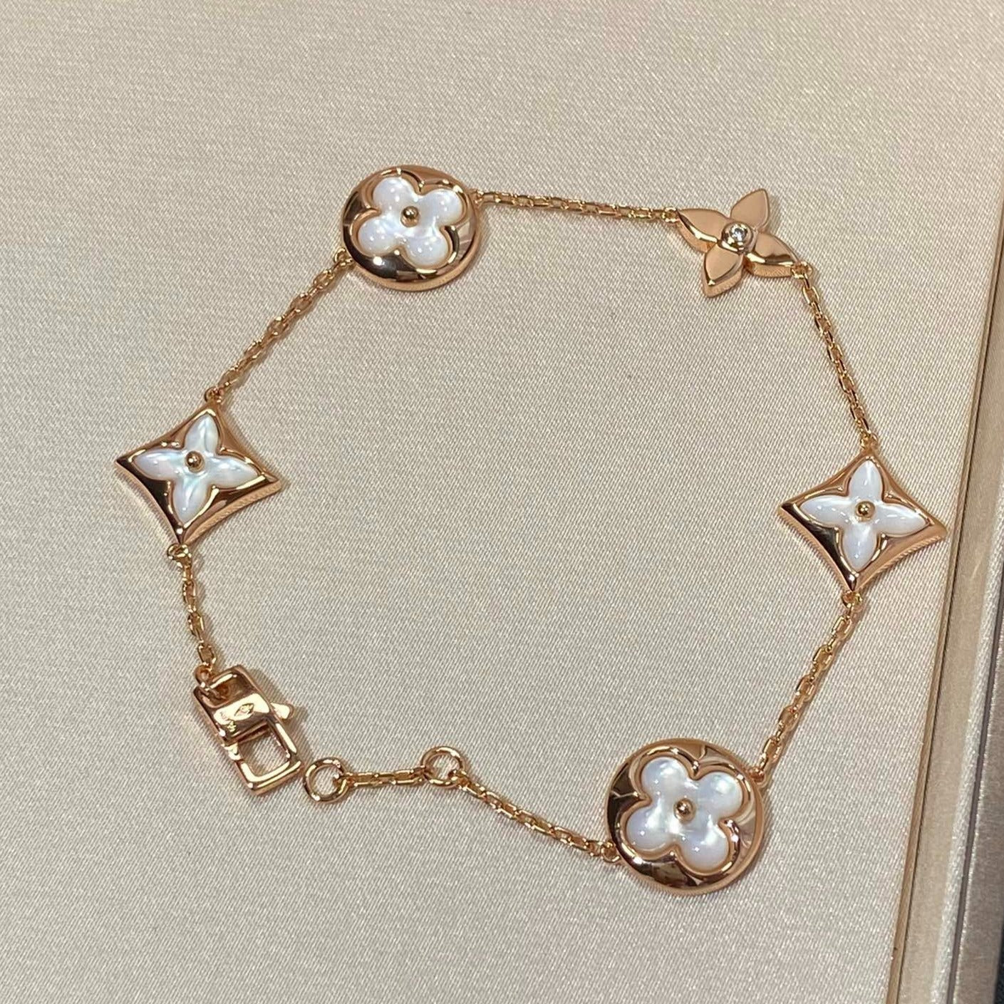Mysitc STAR AND SUN 5 MOTIF MOP PINK GOLD BRACELET