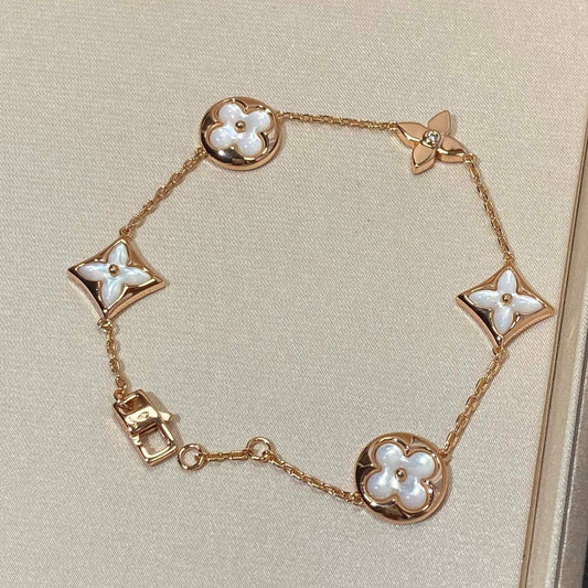 Mysitc STAR AND SUN 5 MOTIF MOP PINK GOLD BRACELET