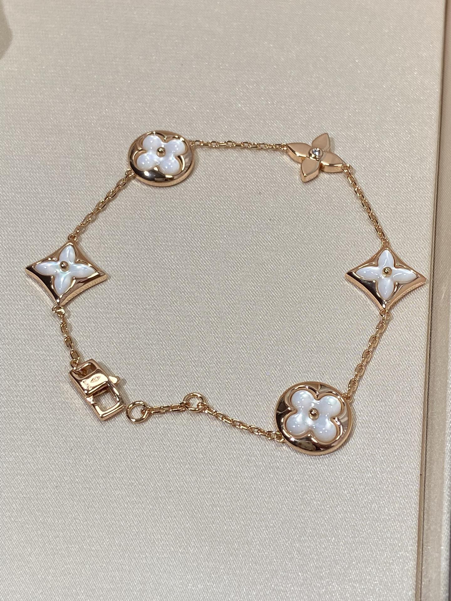 Mysitc STAR AND SUN 5 MOTIF MOP PINK GOLD BRACELET