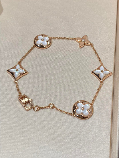 Mysitc STAR AND SUN 5 MOTIF MOP PINK GOLD BRACELET