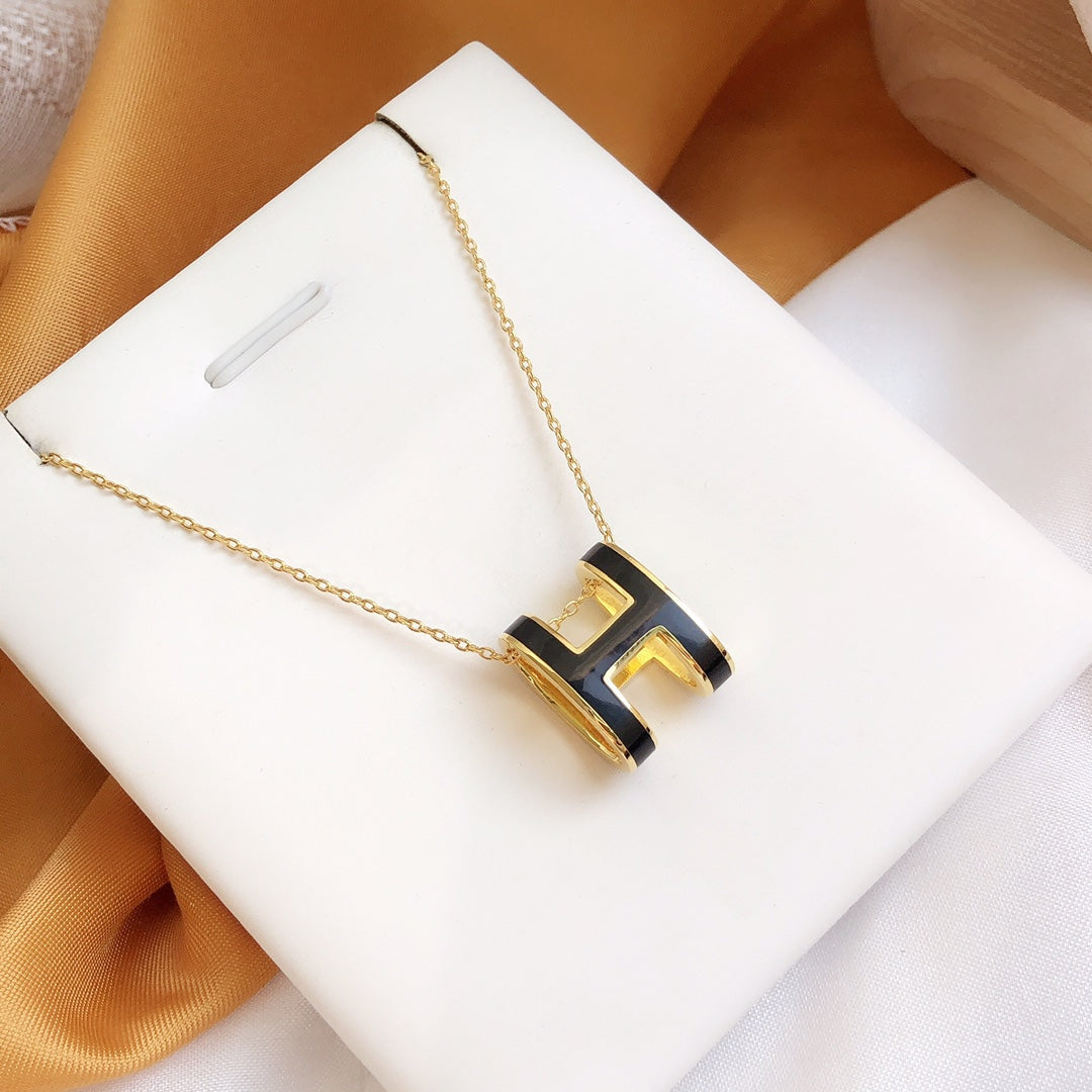 Mysitc HM CLIC BLACK ENAMEL GOLD NECKLACE