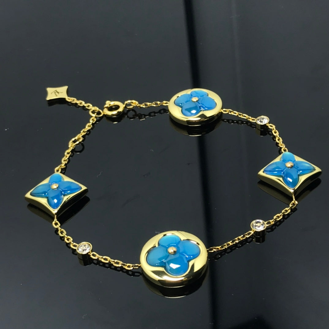 Mystisches STERN- UND SONNE-4-MOTIV-BLAUES ARMBAND